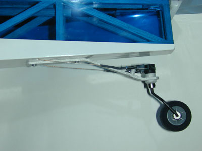 Detail of Great Planes scale tailwheel with pull-pull setup