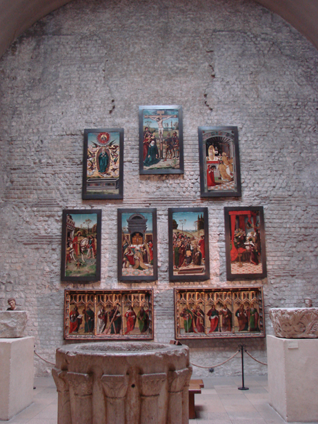 Medieval panels hung on Roman wall